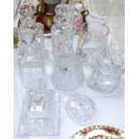 Three cut glass decanters; a cut glass jug; etc.