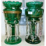 A 19th century matched pair of green glass lustres with cut glass drops