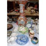 A large Imari pattern vase with flared rim, heavily restored with staples; a selection of Wedgwood