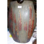 Beresford Pealing: a slab built vestment vase with drip glaze over brown high fired body, signed