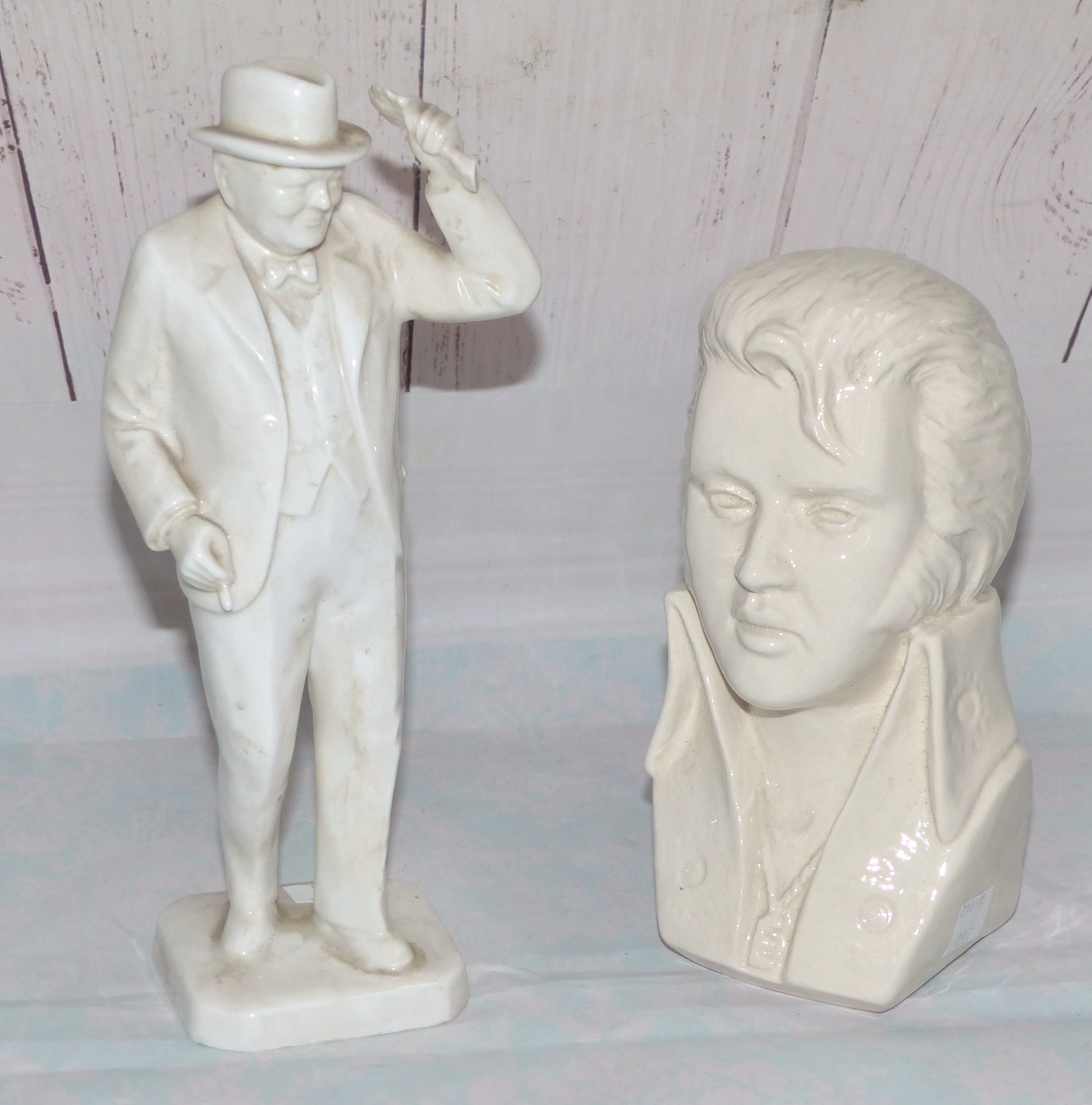 A Spode bone china figure of Sir Winston Churchill, 9"; a bust of Elvis Presley