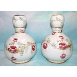 A pair of James MacIntyre vases designed by William Moorcroft, '18th Century' pattern, globular form