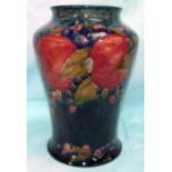 A William Moorcroft large vase, Pomegranate pattern on blue ground, impressed, signed in green,