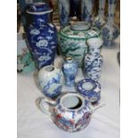 A Chinese blue and white vase of inverted baluster column form, height 11½" (finial missing); a