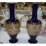 A pair of Royal Doulton stoneware "Slater's Patent" vases of baluster form, with slender tapering