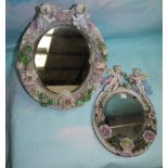 Two Dresden style oval mirror encrusted with cherubs and flowers; other similar china