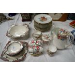 A Paragon 15 piece floral coffee set; a set 12 Bavarian china dessert plates decorated in polychrome