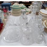A cut liqueur set with decanter; 6 tots and tray; 4 other decanters; glassware