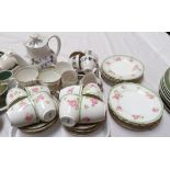 A Royal Doulton "Burgundy" 15 piece coffee set; a 1930's Royal Doulton rose pattern part tea