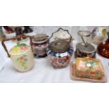 Two Japan pattern biscuit barrels with silver plated rims; a similar butter dish on silver plated