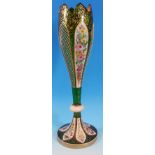 A 19th century tall green glass bowl, tulip shaped with overlaid floral painted and crosshatched