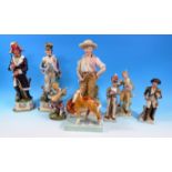 A Royal Worcester group: "Foals" by Doris Lindner; a Victorian bisque figure of a boy; 2