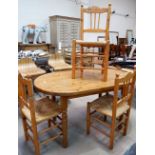 A pine kitchen table and 3 chairs