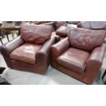 A pair of Halo Furniture brown leather armchairs