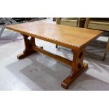 A golden oak refectory style coffee table
