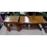 A reproduction burr walnut nest of 3 occasional tables and coffee table