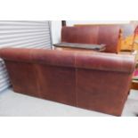 A Halo Furniture large bed with brown leather headboard and foot, 74"