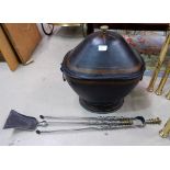 An early 19th century oval coal bucket in Japanned metal and gilt; a pair of steel fire irons