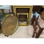A gilt picture frame; a brass picture frame, a brass table top with 2 sets of legs' a serpentine