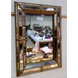 A cushioned frame wall mirror; pictures and prints