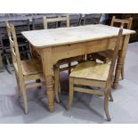 A pine scrub top kitchen table and 4 similar chairs