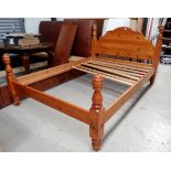 A pine double bed