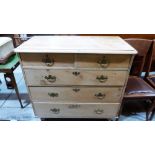 A Victorian pine chest of two short over three long drawers on turned legs. 40'' wide