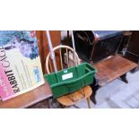 A South African stinkwood occasional table, a stickback chair, a lawn seeder and a rabbit cage