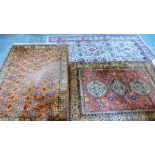 Three eastern rugs