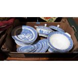 A box of blue and white ceramics