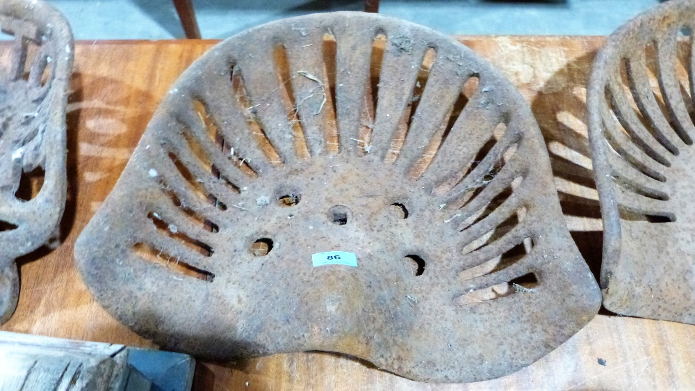 A cast iron tractor seat