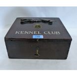 A Victorian mahogany box inscribed 'Kennel Club' with applied carved horn hound to the lid. 10''