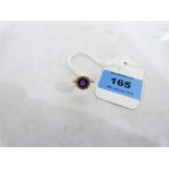 An amethyst solitaire ring. In gold marked 375. Size J. 2.7g gross