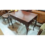 A George III mahogany silver table, the moulded top over two end frieze drawers, raised on