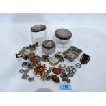 Costume jewellery, two silver salts and three silver topped jars