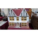 A scratch built doll's house. 36'' wide x 31'' high