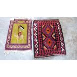 A kilim prayer mat and another small rug