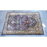 A blue ground eastern silk rug. 60'' x 40''