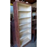 A pine open bookcase of six shelves. 75'' high