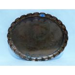 An Arts and Crafts copper oval tray with crimped rim. 20'' wide