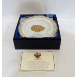 A boxed set of four Limoges collector's plates in commemoration of Faberge eggs