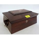 A George IV rosewood lady's workbox with ring handles and mother-of-pearl vacant cartouche and