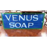 A glass sign for Venus Soap. 18'' x 47''