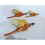 Three Beswick graduated flying pheasants, 6611, 6612 tail re-stuck and 6613 wing re-stuck