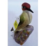 A Royal Worcester Woodpecker 3249. 7'' high