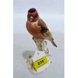 A Royal Worcester model of a Goldfinch 2667. 6'' high