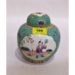 A Chinese famille-rose jar and cover painted with figures in two reserves. 5¾'' high. Cover with