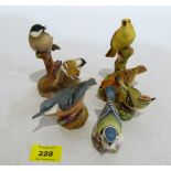 Five Royal Worcester bird figures or groups