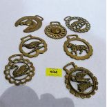 Seven antique horse brasses