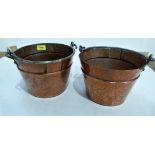 A pair of beaten copper pails with iron swing handles. 6½'' high